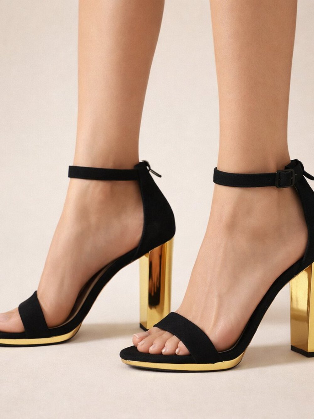 Elegant black with metallic gold high heel shoes